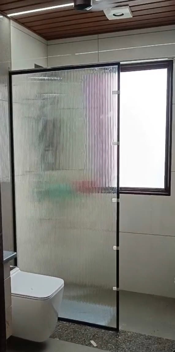 Fluted glass in a slim black frame